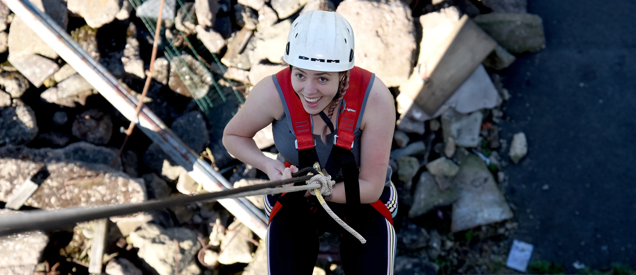 Woman abseiling at Women in the Fire Service event at the Fire Service College