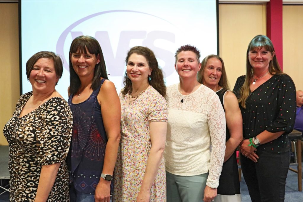 Six women Chief Fire Officers, past and present, standing together